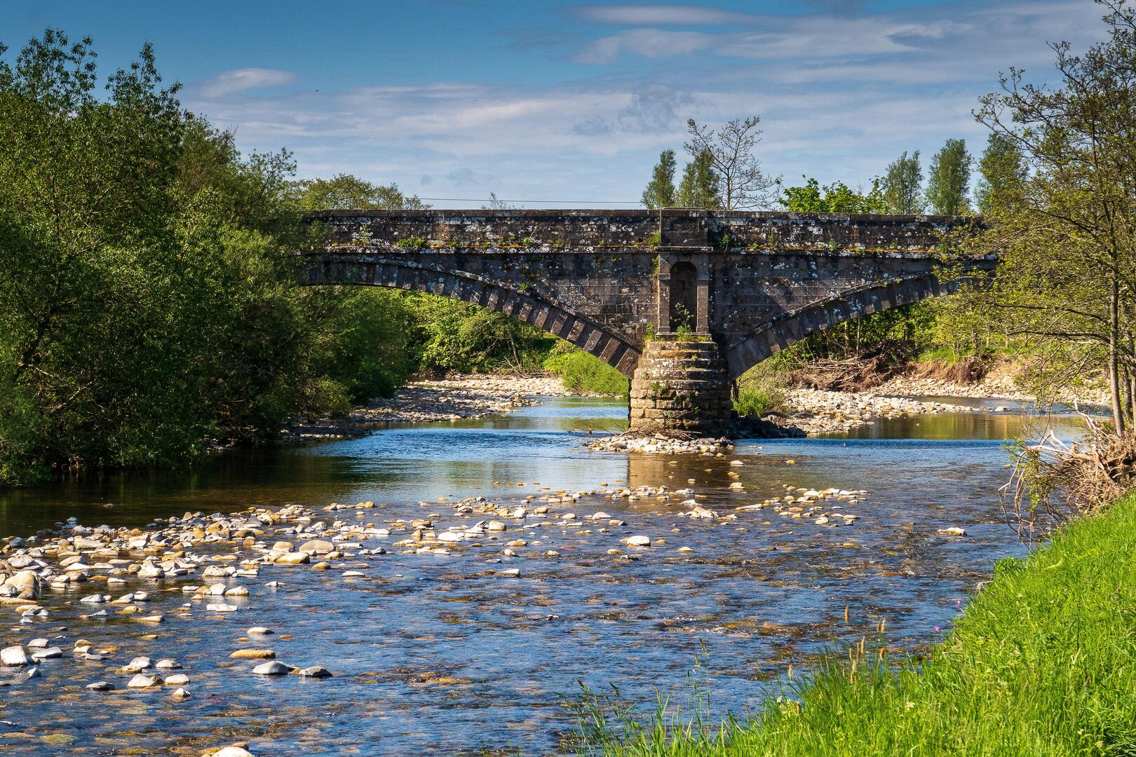 Stone bridge over Liddel Water in Newcastleton, Scotland.