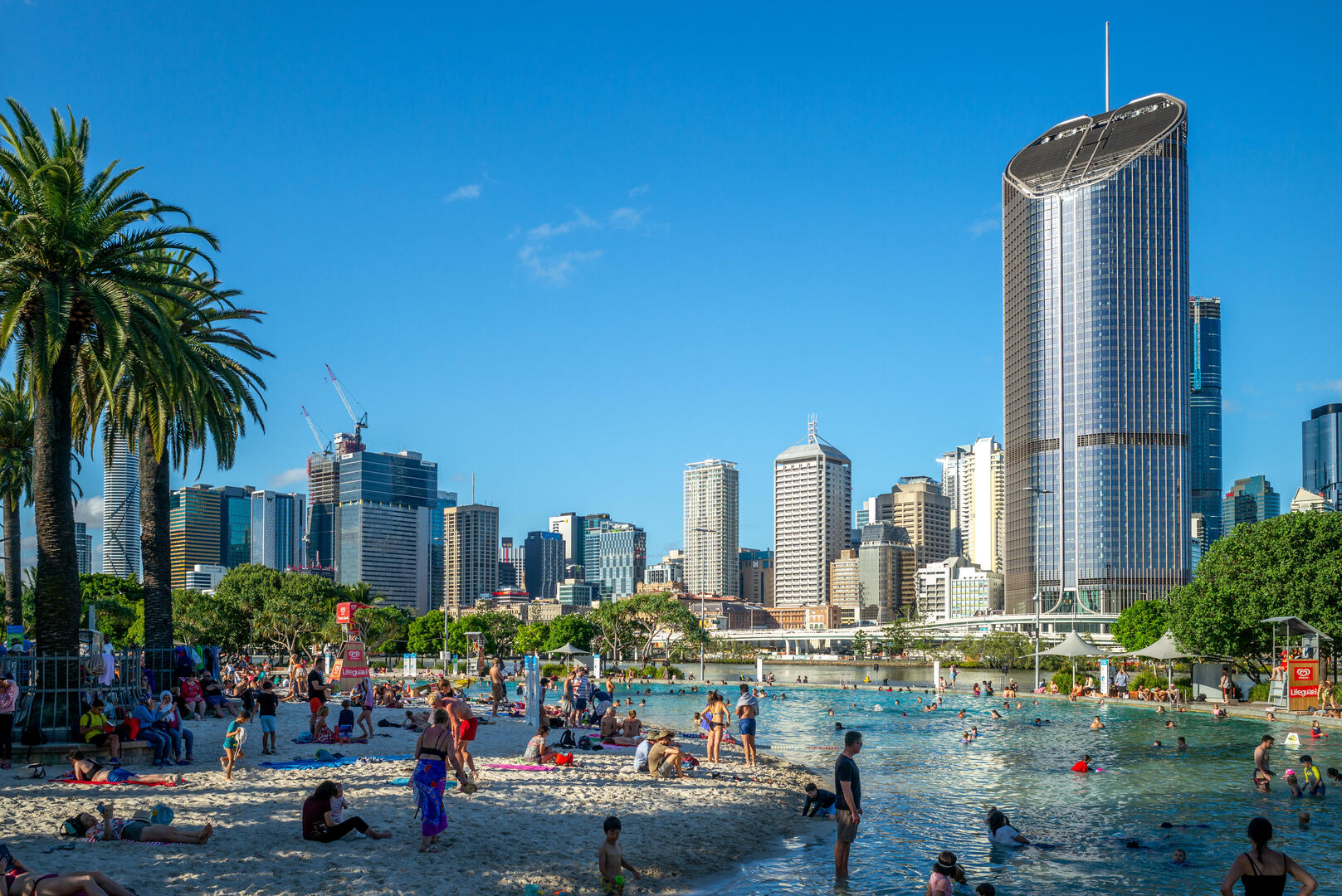 Brisbane's Streets Beach, an inner-city man-made beach with people swimming and relaxing.