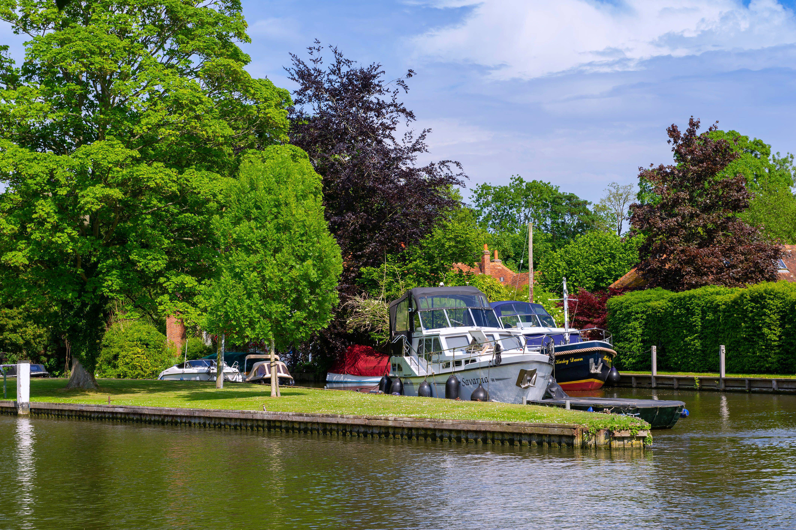 Boats moored on the River Thames at Hurley Lock