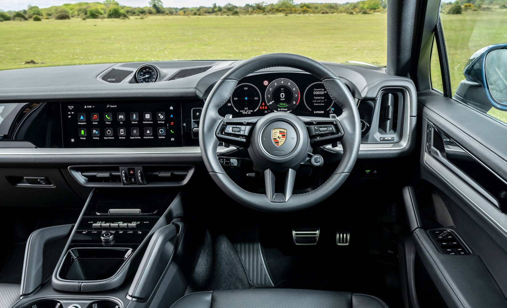 Porsche Cayenne interior dashboard view.